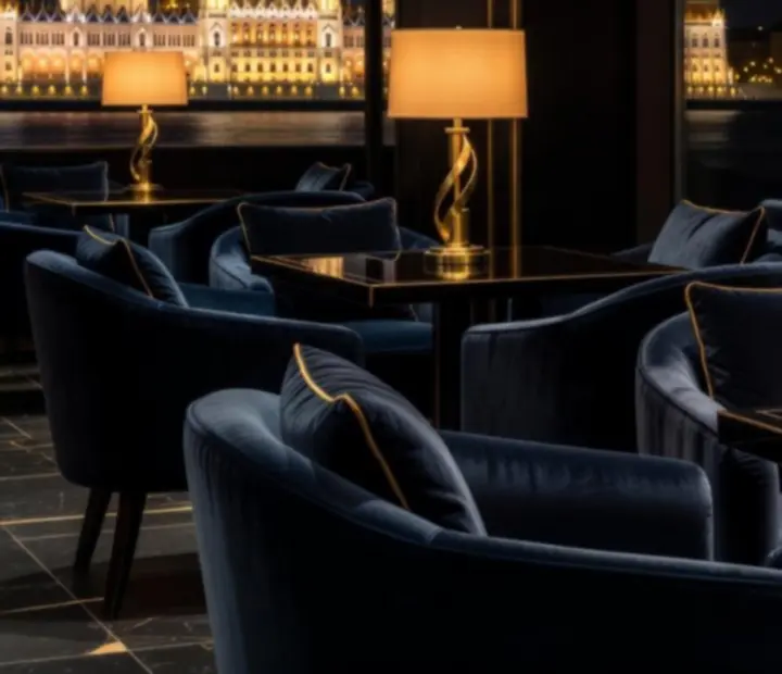 Deluxe lounge ülőhelyek, meleg fényű lámpák és exkluzív budapesti belső tér